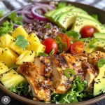 Close-up of a vibrant Hawaiian chicken salad with fresh ingredients displayed.