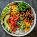 ['Close-up of a Turkey Taco Meal Prep Bowl featuring ground turkey, fresh vegetables, and toppings.', 'Side view of an appetizing Turkey Taco Meal Prep Bowl filled with turkey, beans, and avocado slices.', 'Colorful Turkey Taco Meal Prep Bowl showcasing ground turkey, cilantro, and fresh salsa on top.', 'Detailed shot of a Turkey Taco Meal Prep Bowl with layers of ingredients including lettuce, corn, and cheese.']