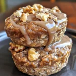 ['Close-up view of cinnamon roll protein muffins, showcasing their fluffy texture and cinnamon swirl.', 'Side view photo of delicious-looking cinnamon roll protein muffins with a golden-brown top.', 'Juicy, baked protein muffins with a cinnamon roll appearance, highlighting their toppings and texture.', 'Plate of protein muffins featuring a cinnamon roll design, captured beautifully with vibrant colors.']