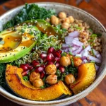 ['Close-up view of a colorful Roasted Acorn Squash Nourish Bowl showing vibrant ingredients.', 'Side angle of a nourishing bowl featuring sliced acorn squash, quinoa, and fresh greens.', 'Detailed image of a healthy nourish bowl with roasted acorn squash and topped with pomegranate seeds.', 'Artistic close-up of a Roasted Acorn Squash Nourish Bowl with kale, chickpeas, and avocado slices.']